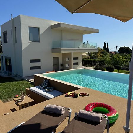 Home21 Asgourou Bagian luar foto