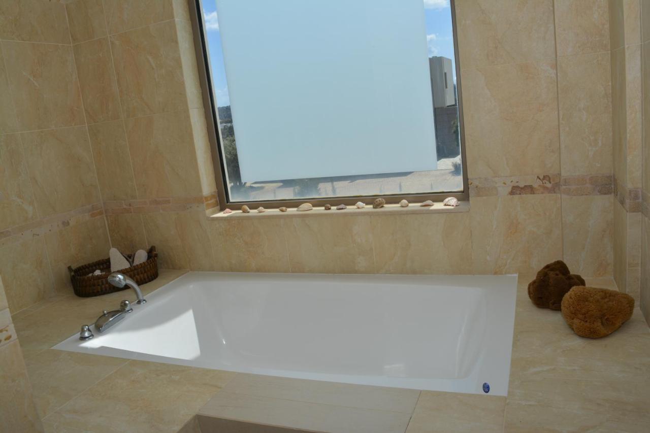 Home21 Asgourou Bagian luar foto